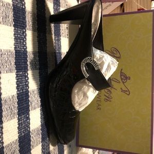 Brighton Beau with a strap and silver hardware